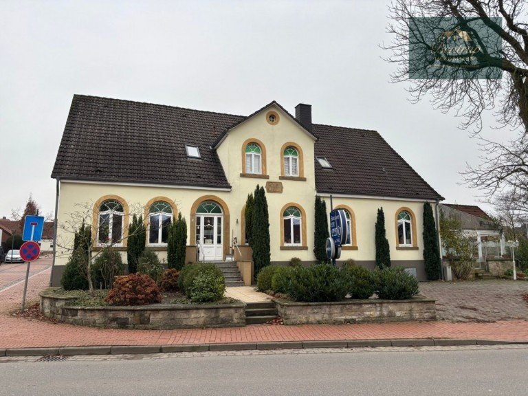 Hauptbild: Einzigartiges Ladenlokal mit Eigentumswohnung