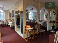 Bild (d941ba15b89bc33bdb919603c277c060): Einzigartiges Ladenlokal mit Eigentumswohnung